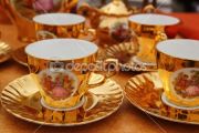 dep_5568977-Ancient-golden-porcelain-cups-coffe-or-tea