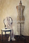 dep_7006694-Antique-dress-form-and-chair-with-vintage-feeling